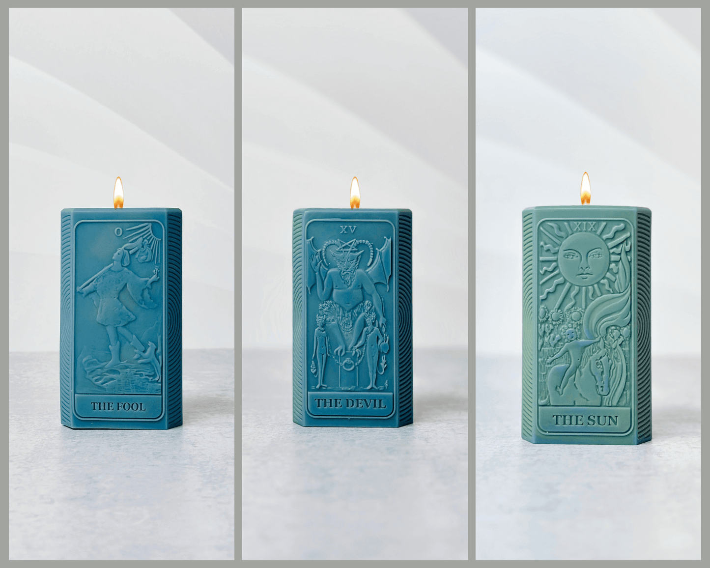 Set of three spiritual candles featuring Tarot card designs: The Fool, The Devil, and The Sun, in teal silicone molds.