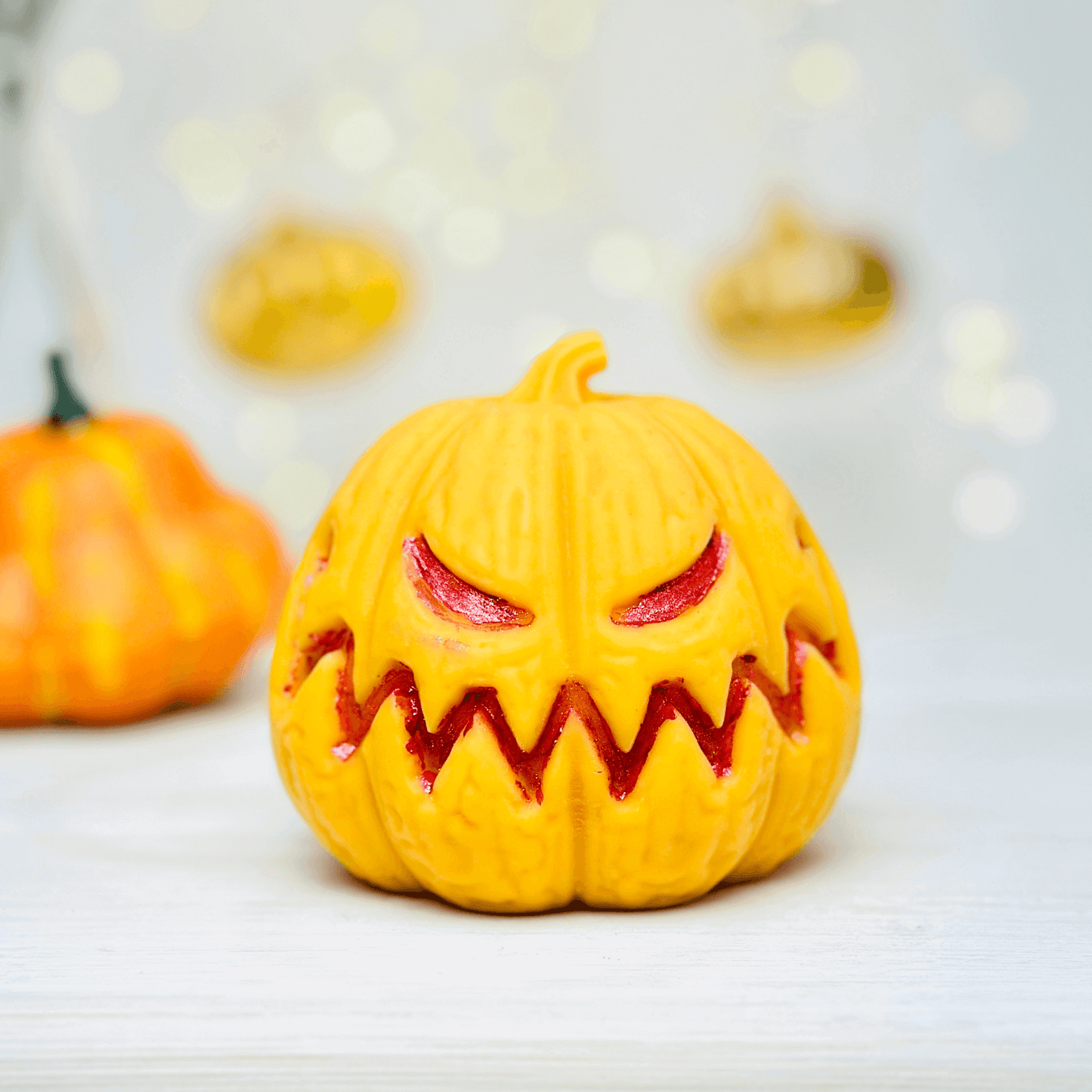 Jack-O-Lantern silicone candle mold showcasing a spooky pumpkin design for Halloween decoration.