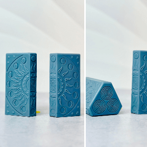 Set of blue silicone molds featuring intricate designs for creating spiritual candles.