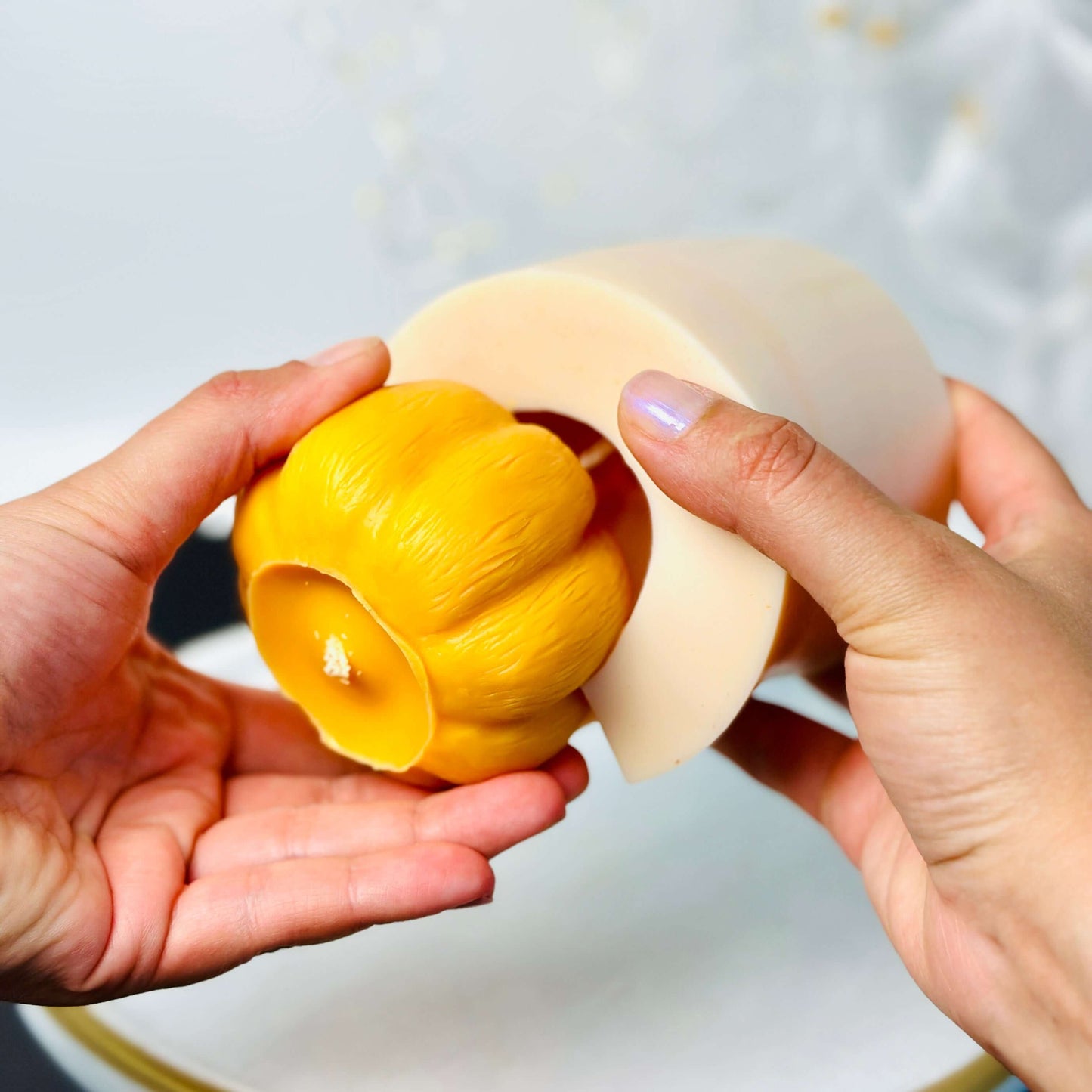 Halloween Silicone Mold, Diy Pumpkin Shape Candle Mold , XLarge - Yellow pumpkin-shaped candle on a plate.