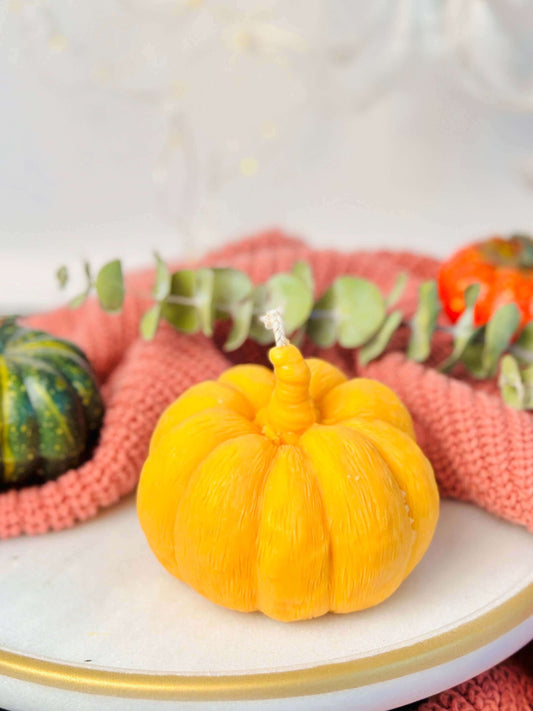 Halloween Silicone Mold, Diy Pumpkin Shape Candle Mold , XLarge - Yellow pumpkin-shaped candle on a plate.