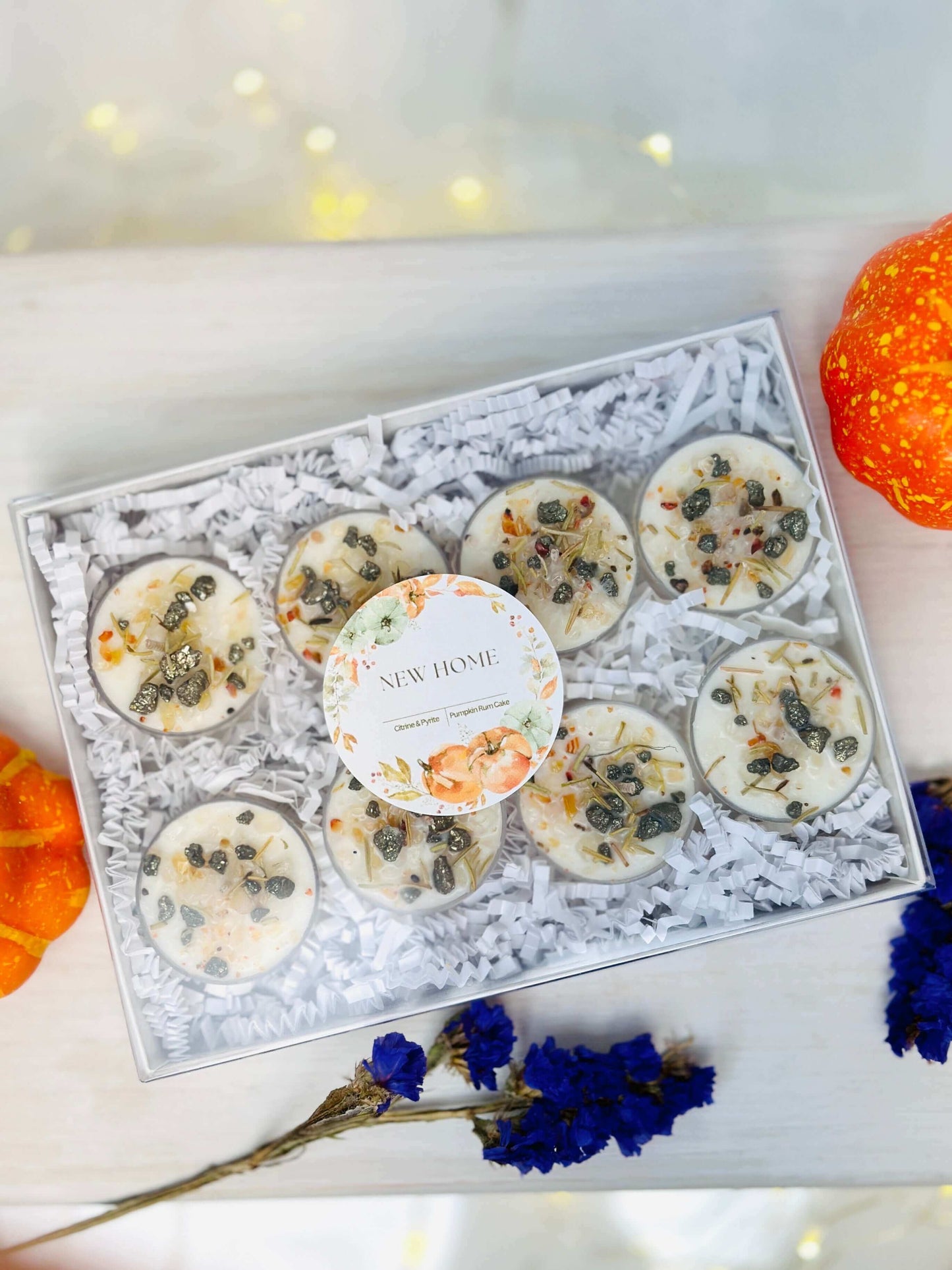Autumn Crystal Tealight Candles set in a gift box with a floral label, perfect for new home protection.