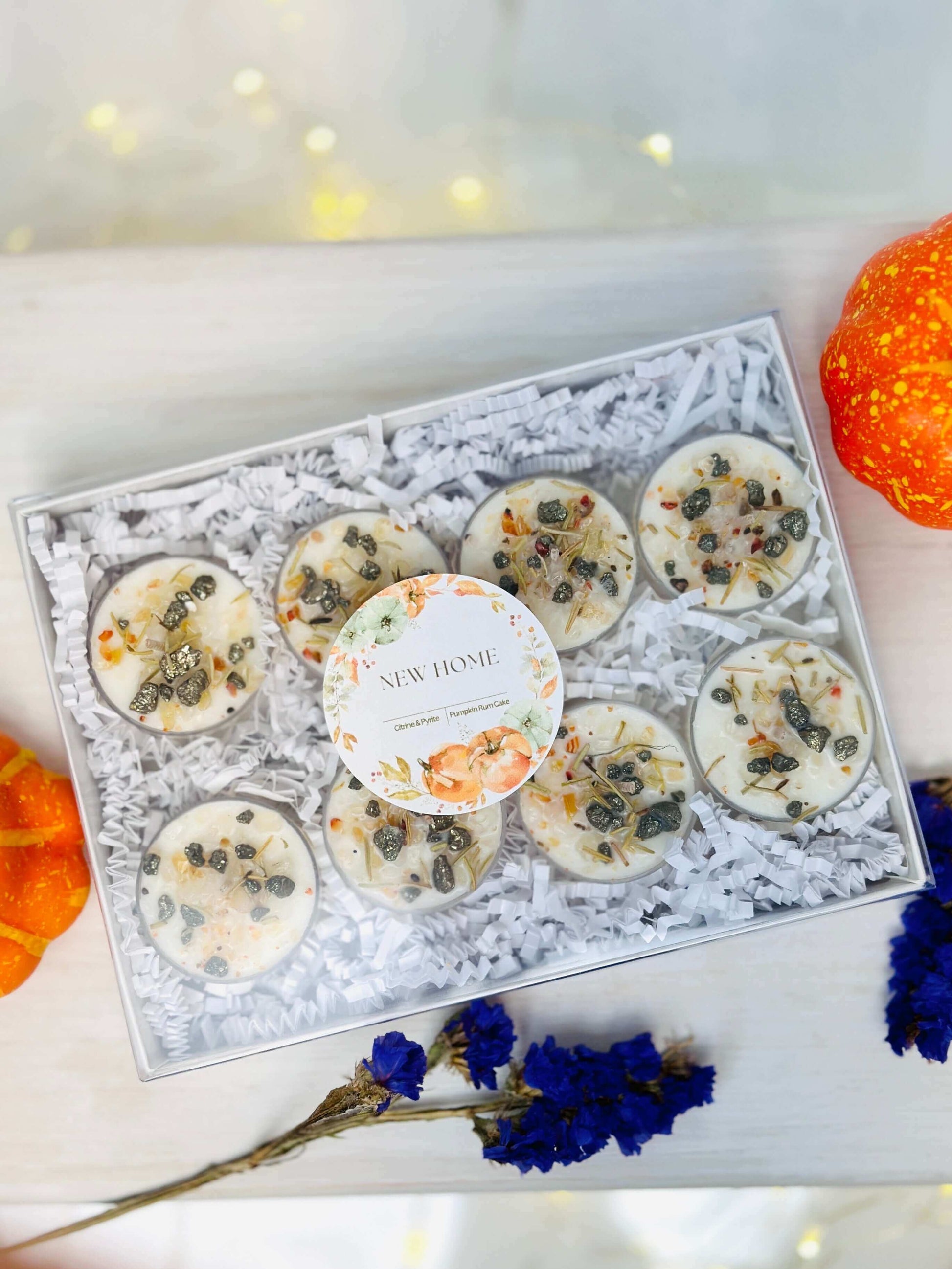 Autumn Crystal Tealight Candles set in a gift box with a floral label, perfect for new home protection.