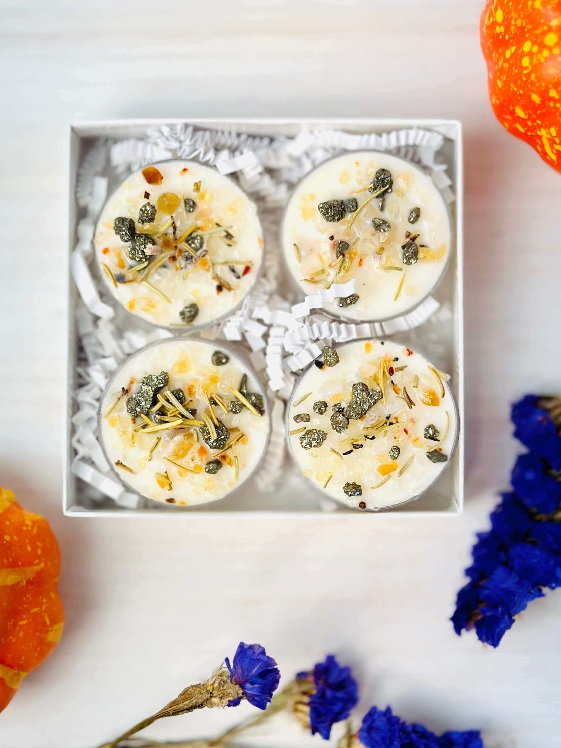 Autumn Crystal Tealight Candles set in a gift box with a floral label, perfect for new home protection.