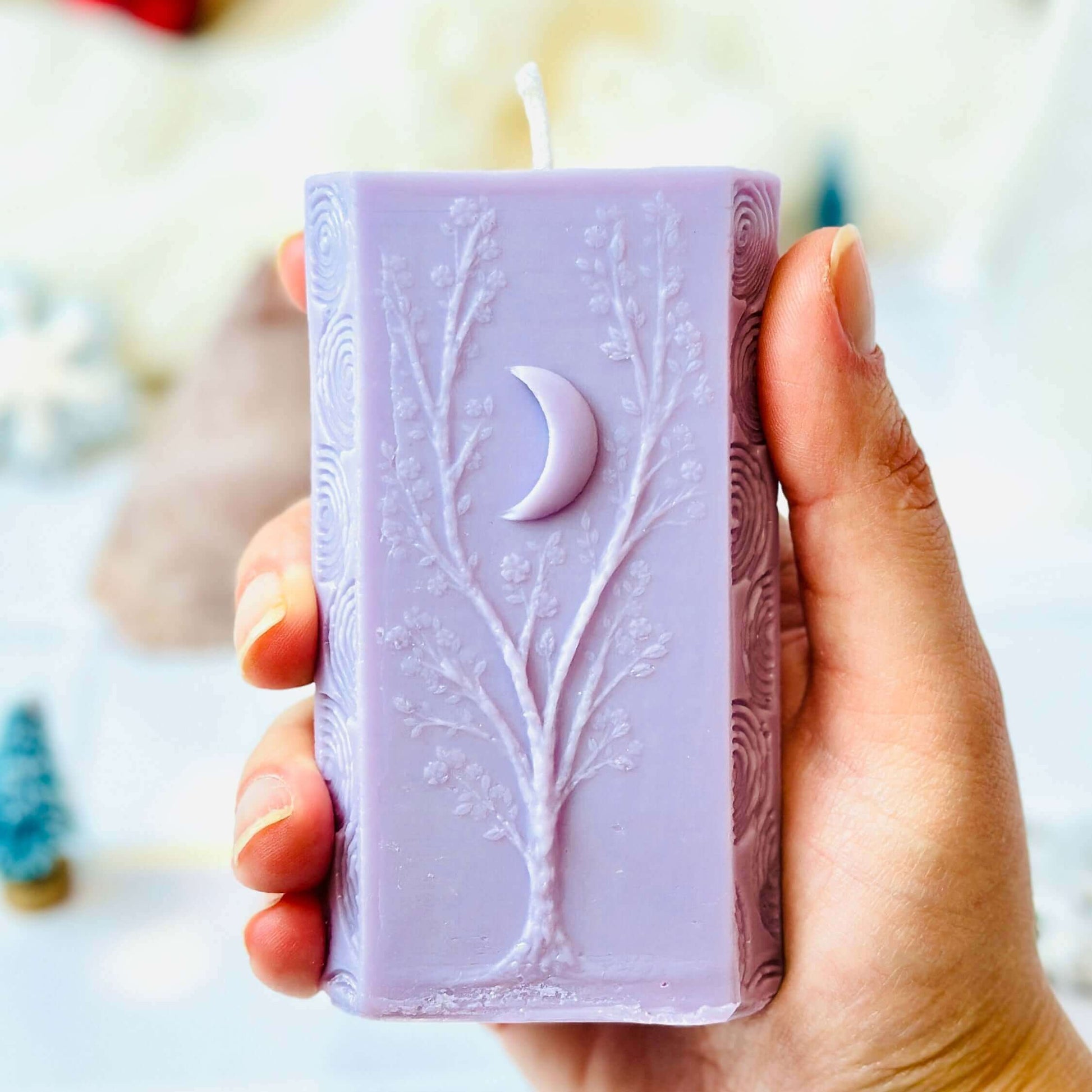 Handheld lavender soy candle with tree and moon design, part of the Moon Phases Spiritual Gift Set.