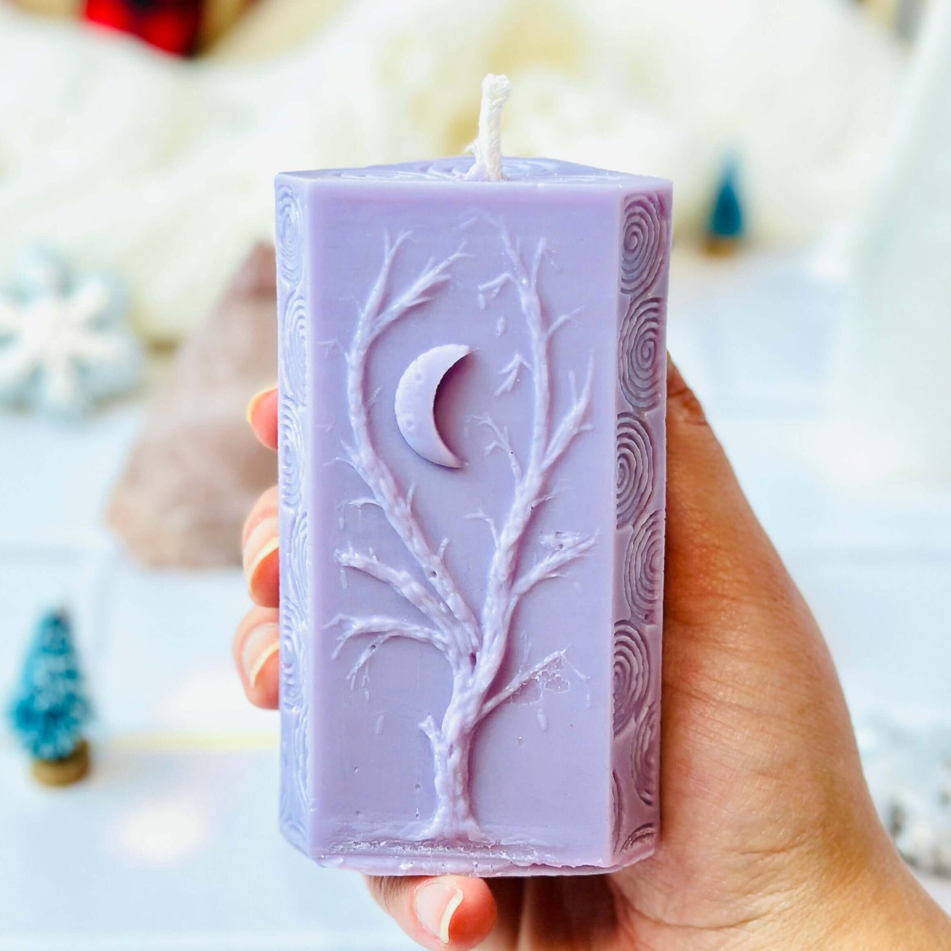 Handheld lavender soy candle with tree and moon design, part of the Moon Phases Spiritual Gift Set.