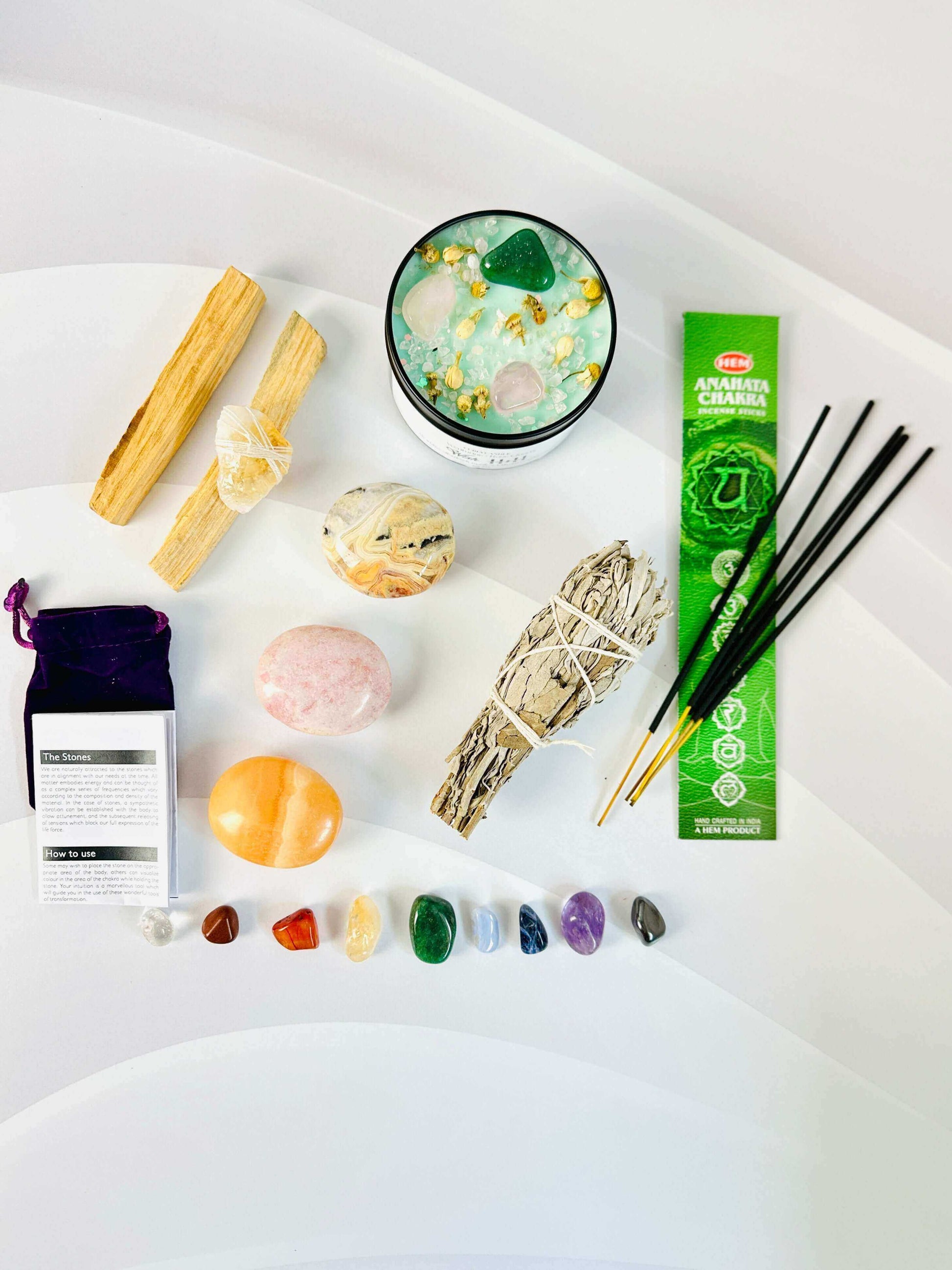 Chakra Balancing Gift Box Set with soy candle, sage, palo santo, crystals, and storage bag for meditation and cleansing.