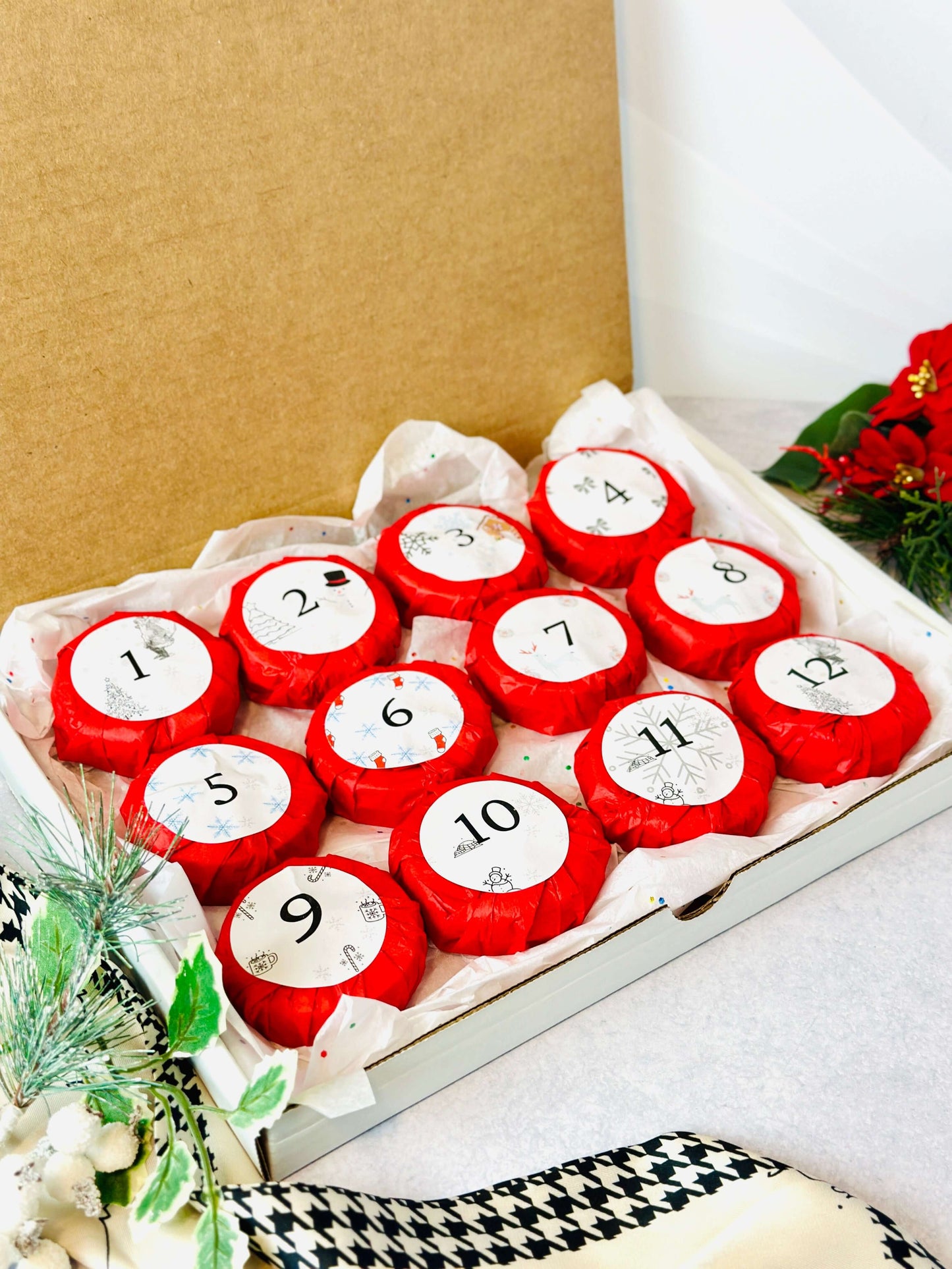 Bookish Candles Advent Calendar 2025 showing 12 red candles in a gift box, perfect for Christmas gifting.