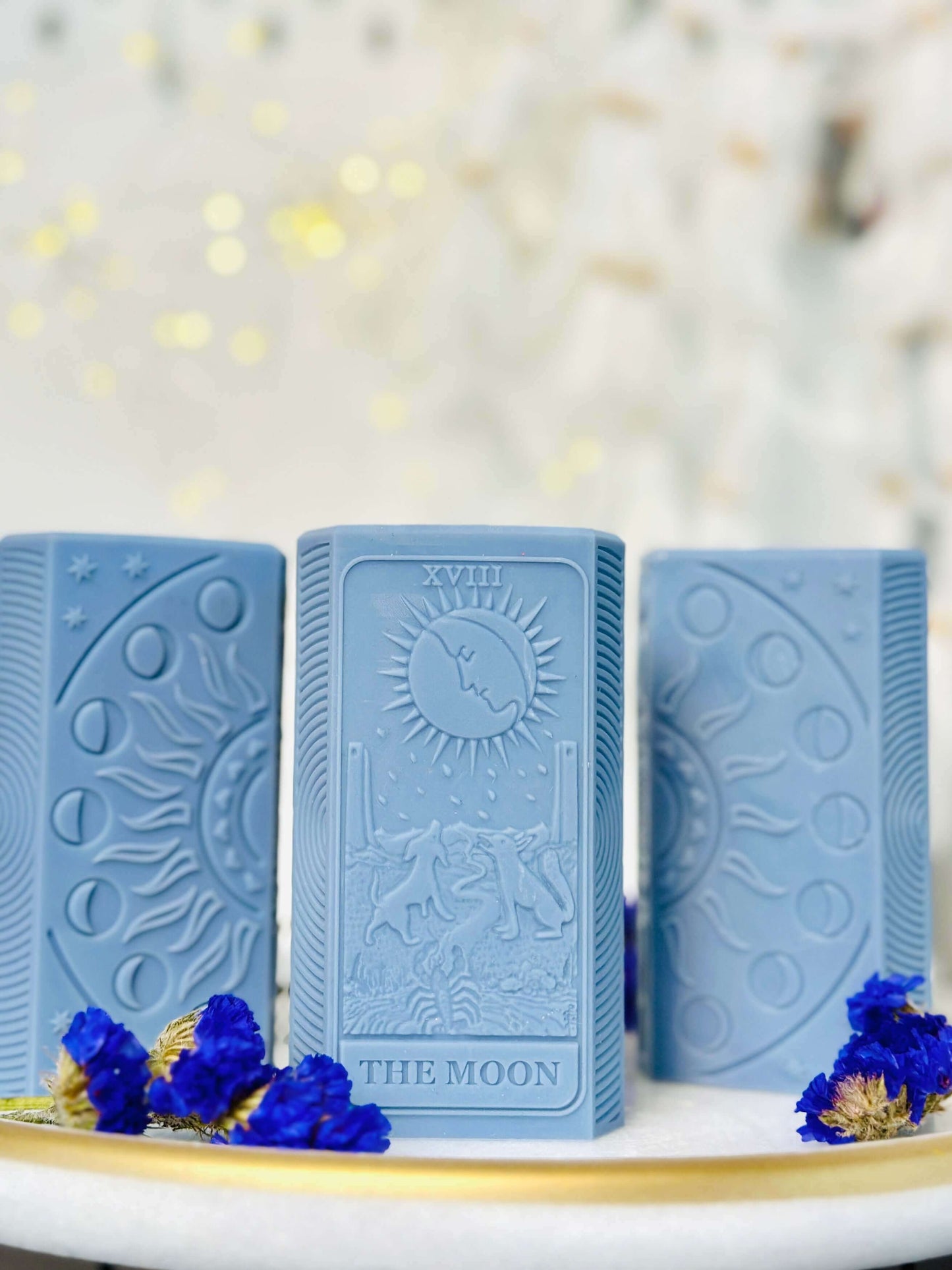 Moon phases silicone candle mold featuring detailed tarot card designs and an illuminated candle.