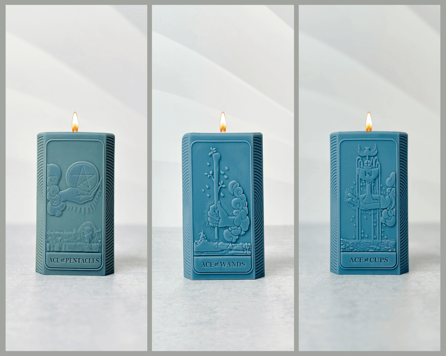 Three blue spiritual candles featuring Ace of Pentacles, Ace of Wands, and Ace of Cups designs.