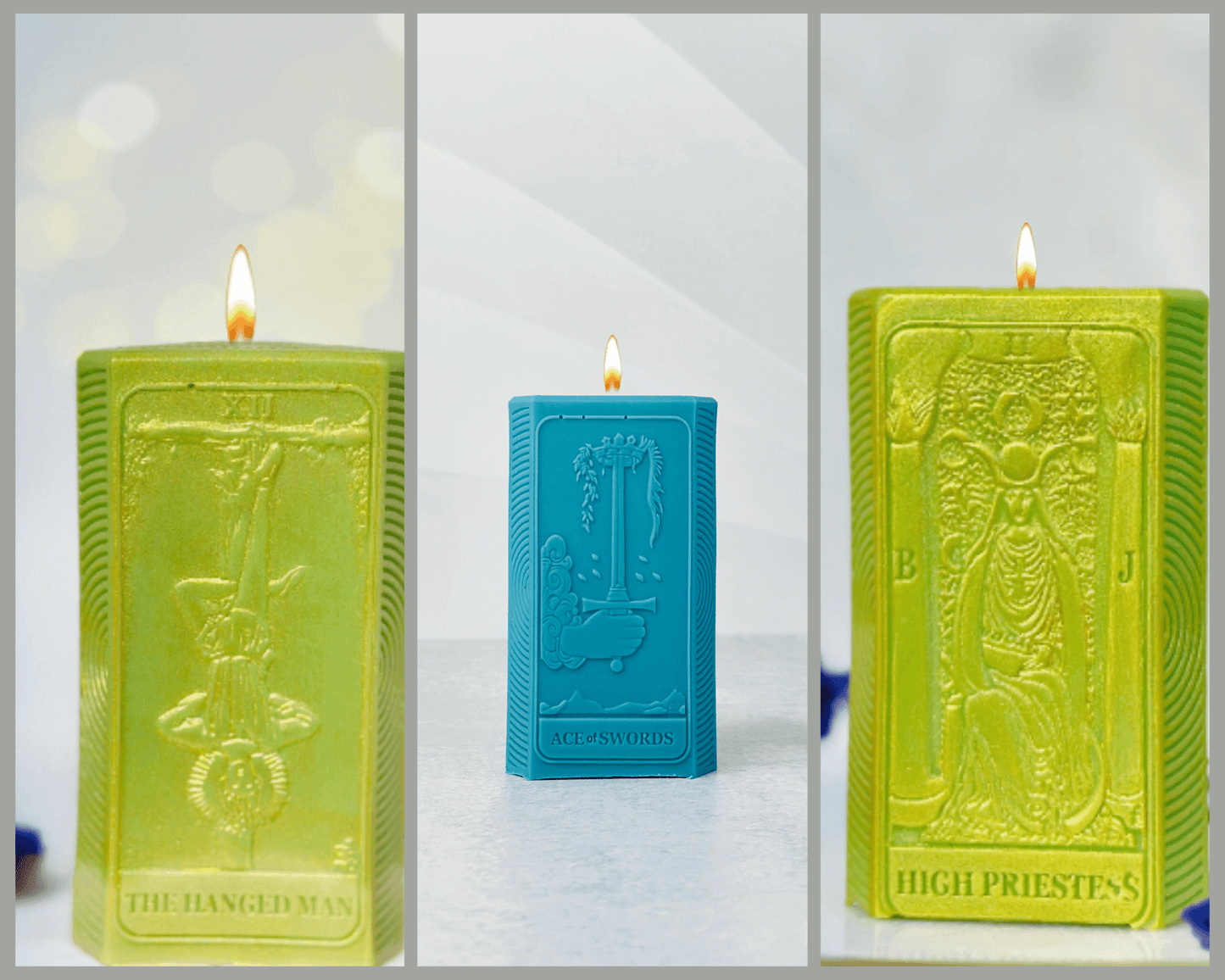 Three spiritual candles featuring The Hanged Man, Ace of Swords, and High Priestess designs in vibrant colors.