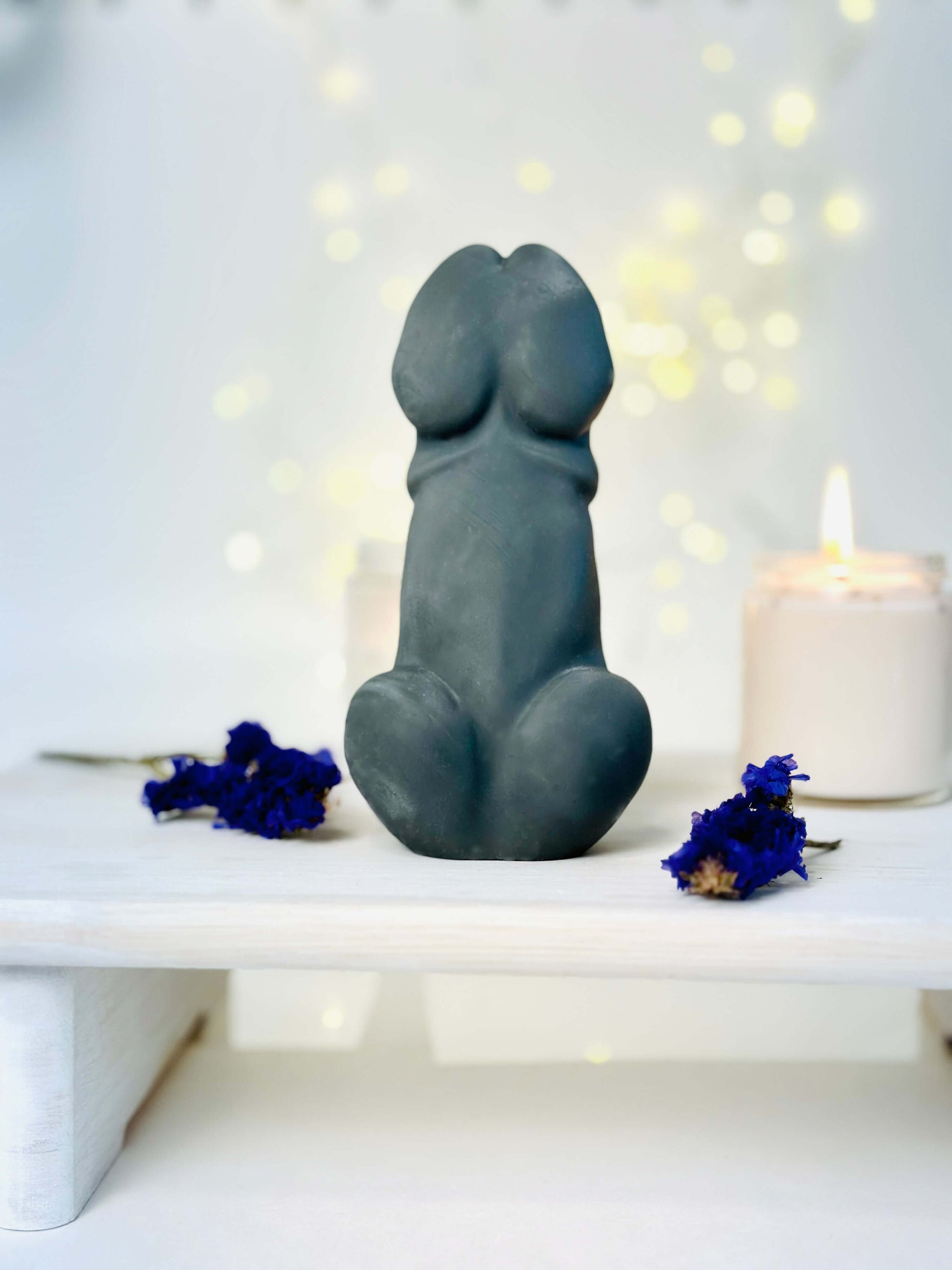 Naughty Bad Bunny Silicone Candle Mold - Large displayed with candles and flowers, ideal for unique candle-making - Back side