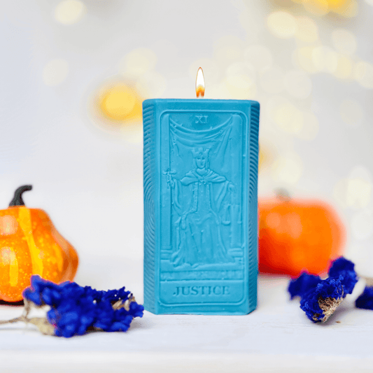 Justice tarot card candle mold creating a stunning blue candle with Justice tarot card design.