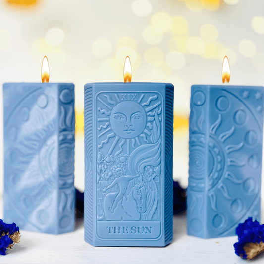 Sun tarot card candle mold featuring detailed design of The Sun in a serene setting.