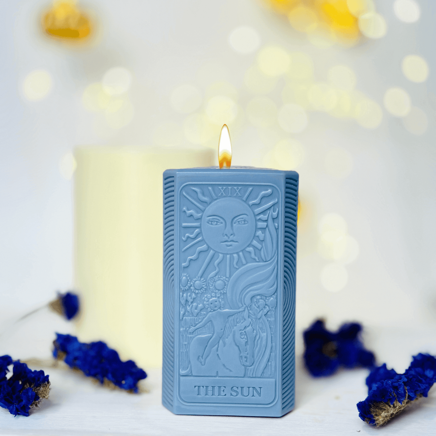 Sun tarot card candle mold featuring detailed design of The Sun in a serene setting.