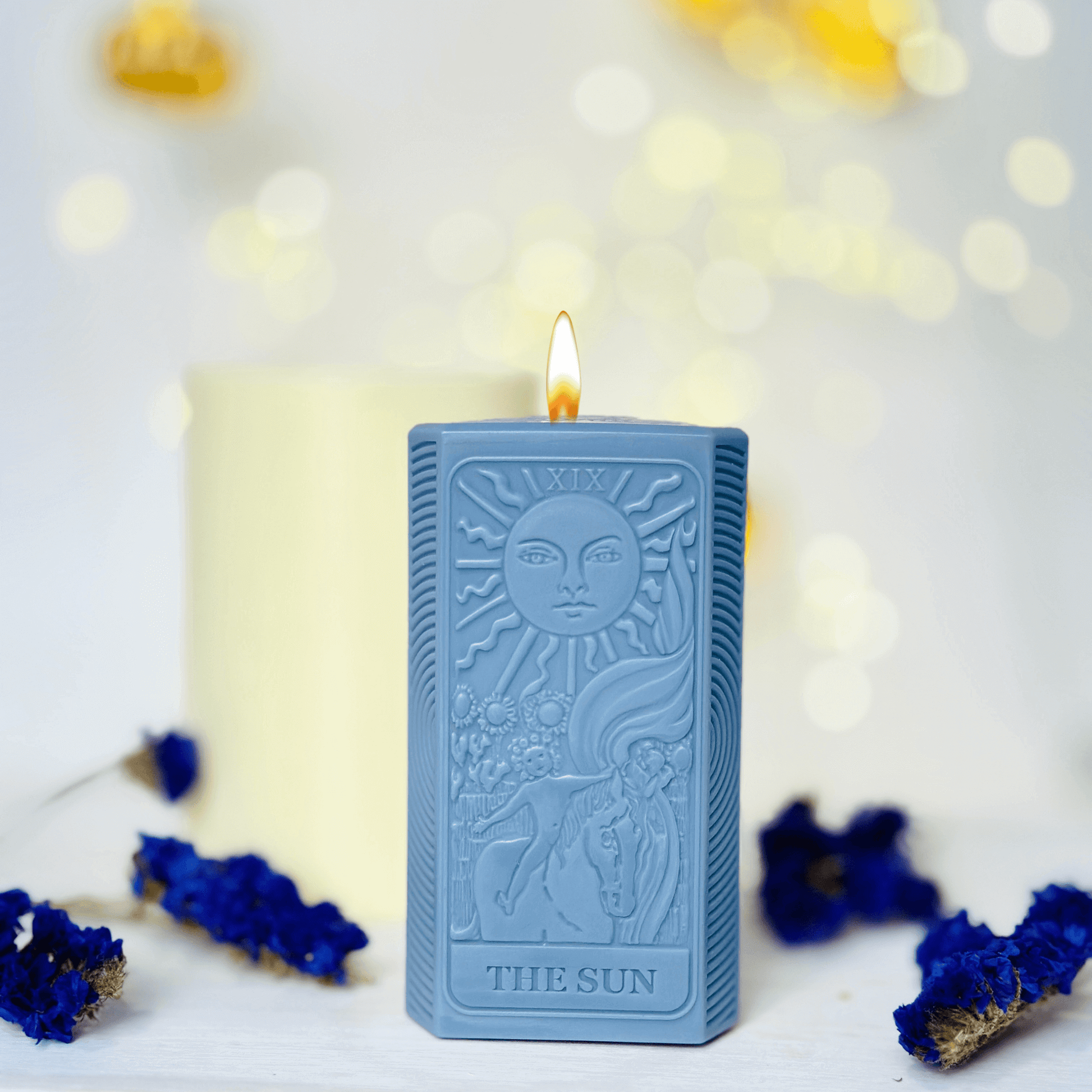 Sun tarot card candle mold featuring detailed design of The Sun in a serene setting.
