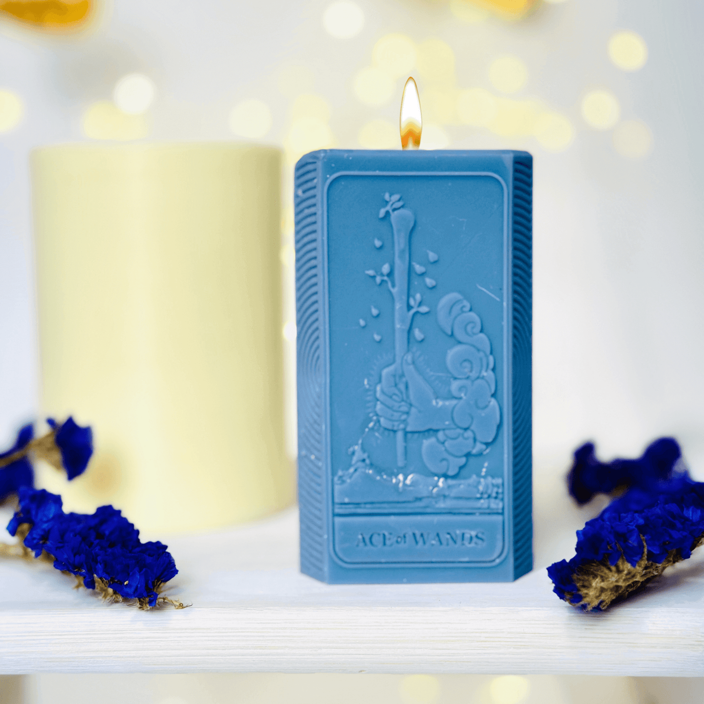 Ace of Wands tarot candle mold, blue candles featuring The Ace of Wands design, spiritual candle creation.