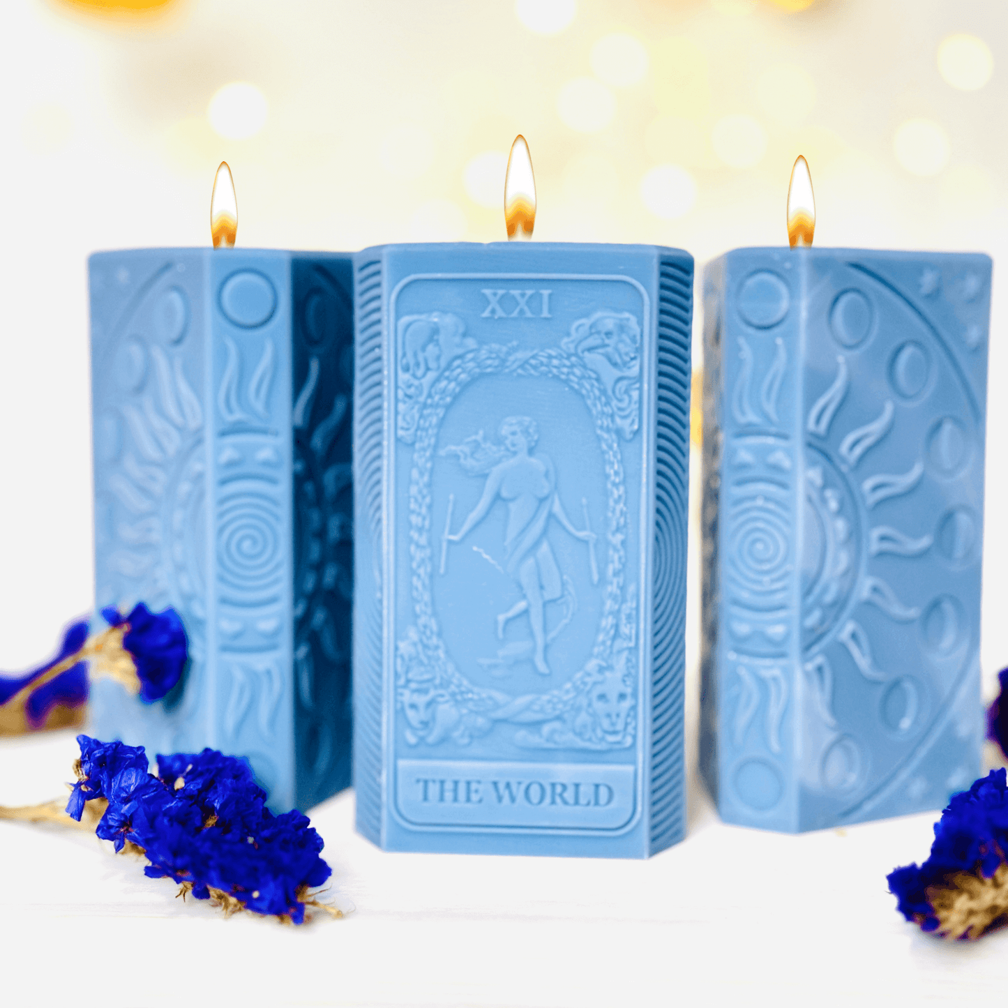 World tarot candle mold showcasing blue silicone candles featuring The World tarot card design.