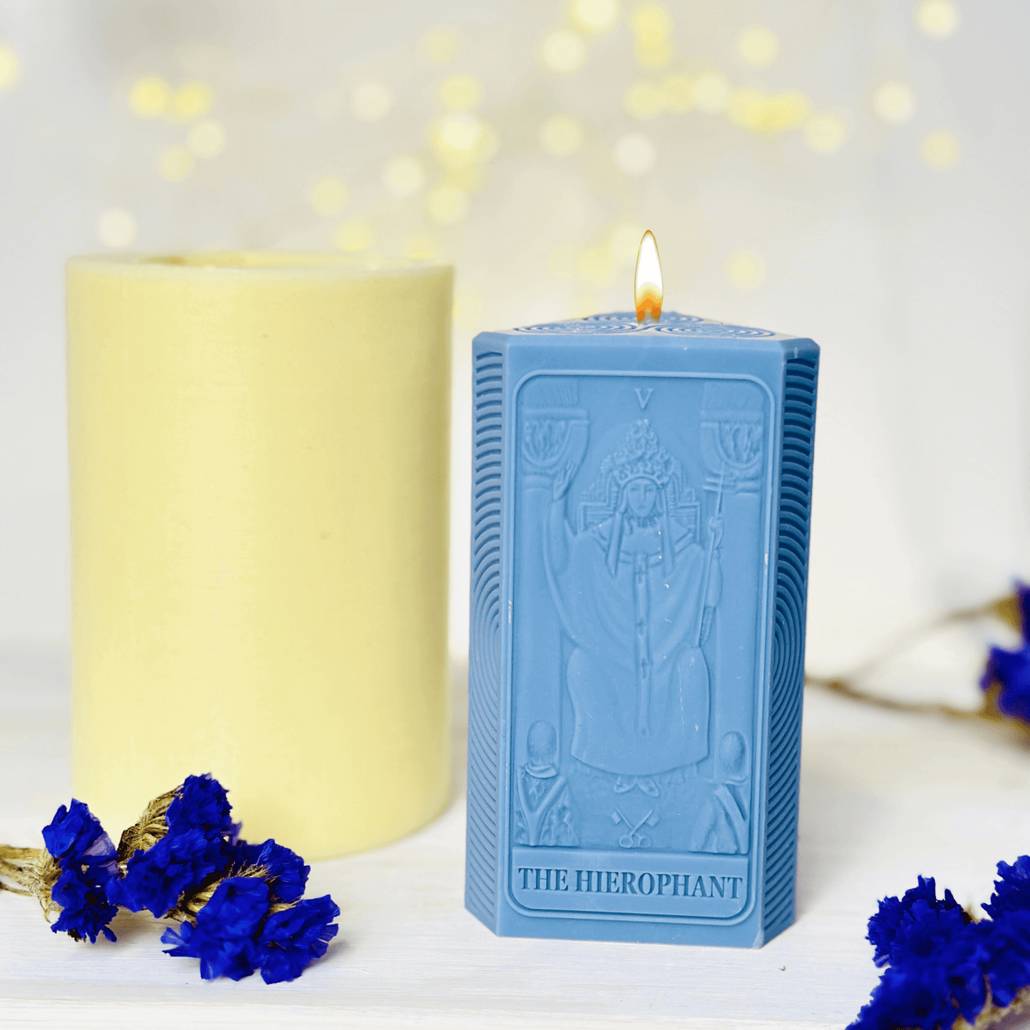 Hierophant candle mold used to create blue spiritual candles featuring the tarot card design.