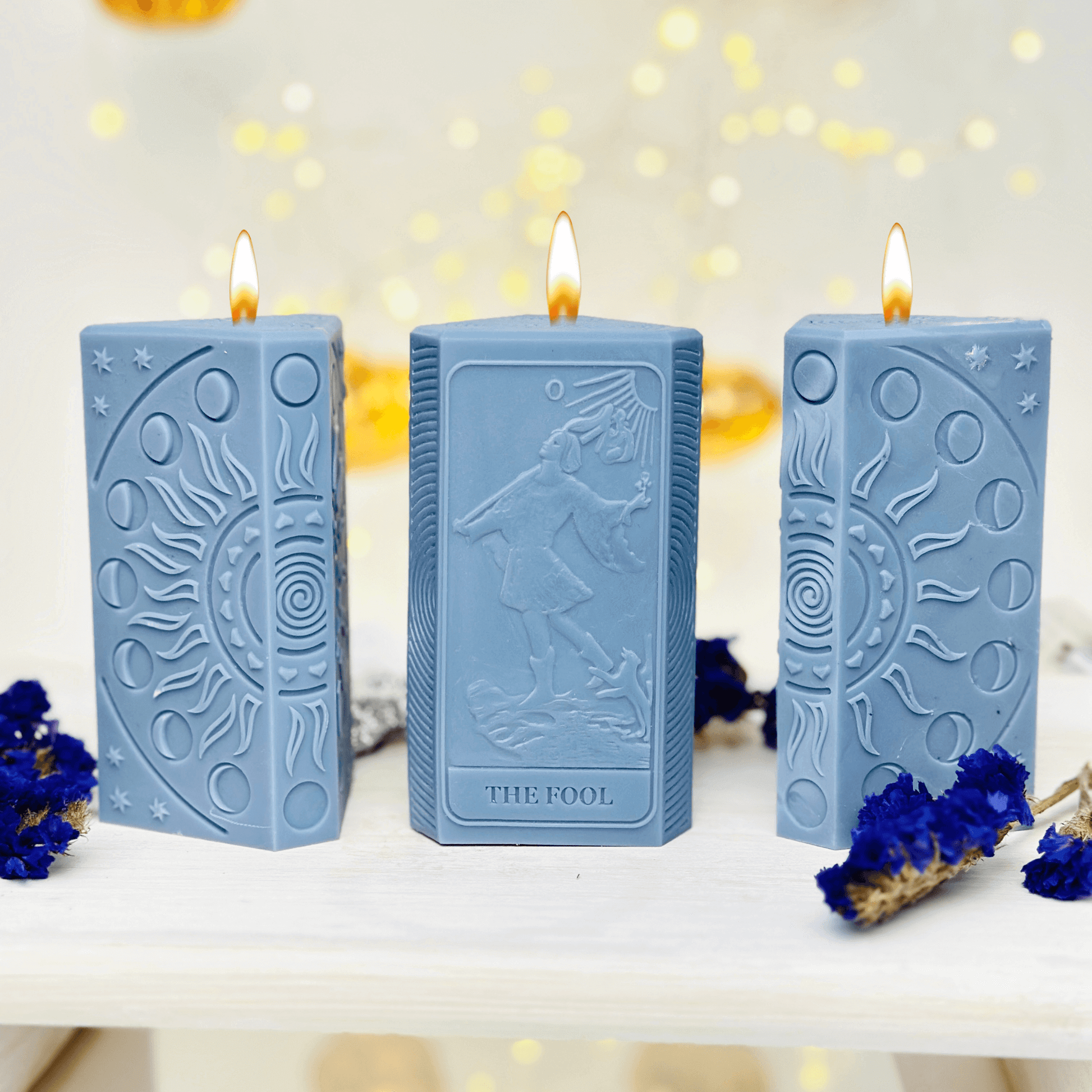 Blue spiritual candles featuring The Fool tarot card and moon phases, crafted from high-quality silicone.