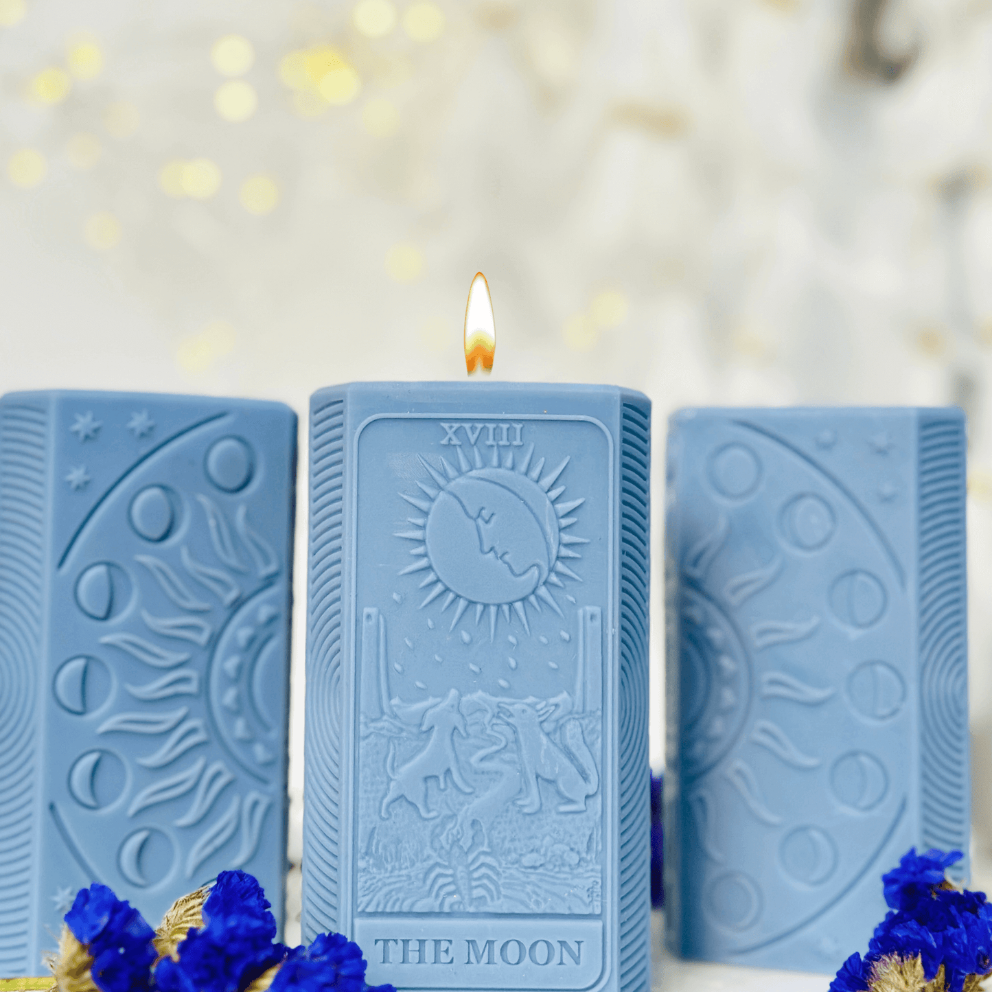 Moon phases silicone candle mold featuring detailed tarot card designs and an illuminated candle.