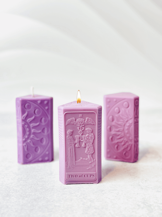 Two of Cups tarot card candle mold in purple, featuring two figures and moon phases, perfect for spiritual crafting.