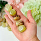 Banded green onyx tumbled crystals